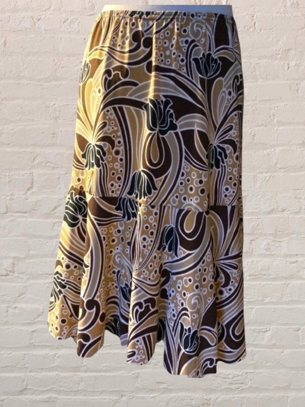 $5$ add on Carol Rose Nwot slinky floral design midi skirt. Size large